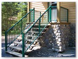 Green Colonial Rail Stairway